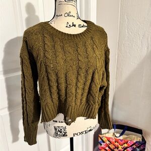 Distressed knitted sweater